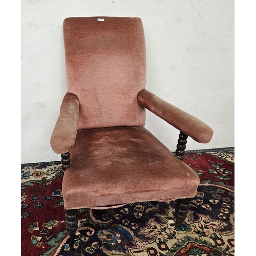 556 - Victorian Armchair, with bobbin shaped arms and legs (some damage), covered with mauve colour fabric