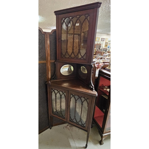 574 - Edw Inlaid Mahogany Corner Cabinet, a single glazed door with mirrored side panels over 2 glazed doo... 