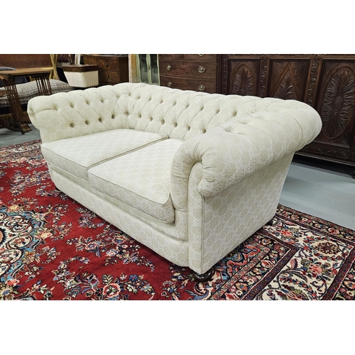 29 - Victorian Chesterfield Roll Top Sofa, recently recovered with cream damask fabric, button backs, on ... 