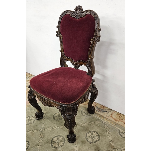 31 - Irish Victorian carved Rosewood Side Chair, the curved back above a red velour covered seat and back... 