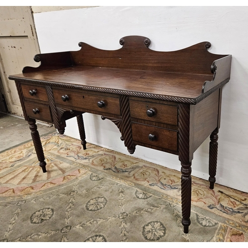 101 - Late 19thC Nelson Mahogany Sideboard  the shaped gallery above 2 centre drawers and 2 side drawers,... 