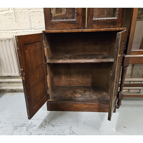 107 - Fine 19thC Mahogany Bookcase - compact sized - the tiered crown above 2 glazed doors and 2 cabinet d... 