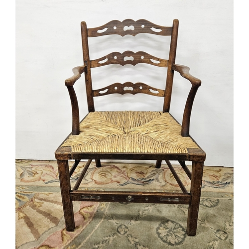 11 - Antique Oak ladder back country Armchair with sugan seat and chamfered legs, fretwork borders, 91cmH... 