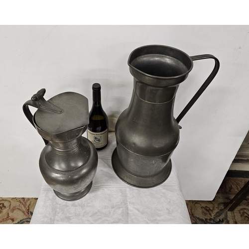 115 - 2 large Antique Pewter Ale/Tavern Jugs, 1 with a hinged lid (45cmH & 35cmH) (2)