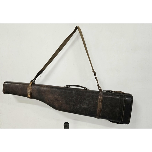 123 - Good leather Gun Case Leg of Mutton shape, with a canvas shoulder strap, 77cmW