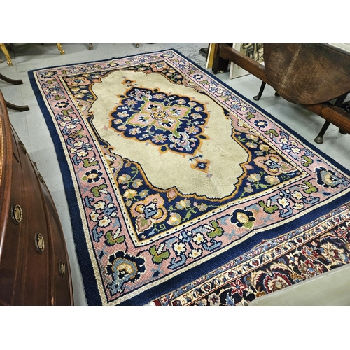 166 - Vintage Wool Rug, purple ground with a colourful floral decorated beige centre, 3mW x 1.95mD