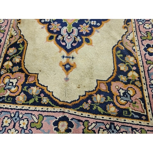 166 - Vintage Wool Rug, purple ground with a colourful floral decorated beige centre, 3mW x 1.95mD