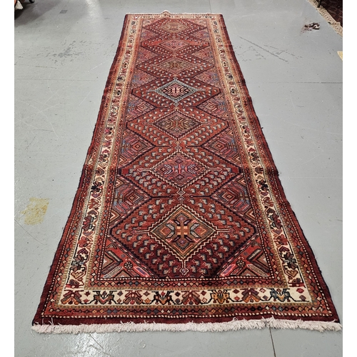 170 - Light red and terracotta ground Persian Runner, diamond medallion design, multi-colour field, 3.60 x... 