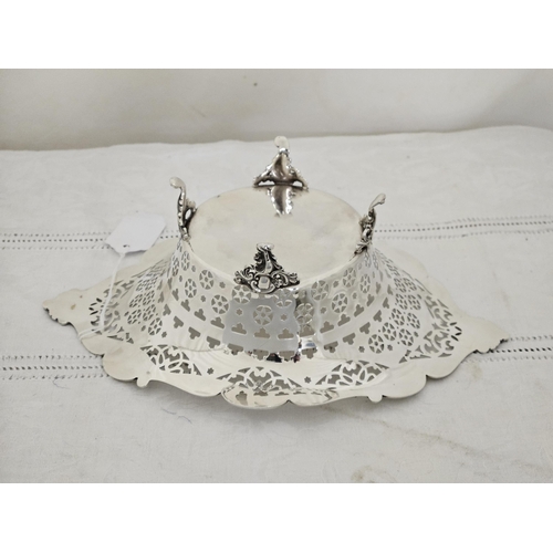 221 - Birmingham Silver Bon Bon Dish, with decoratively shaped borders and fretwork body, raised on  4 cab... 