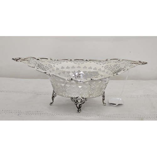 221 - Birmingham Silver Bon Bon Dish, with decoratively shaped borders and fretwork body, raised on  4 cab... 