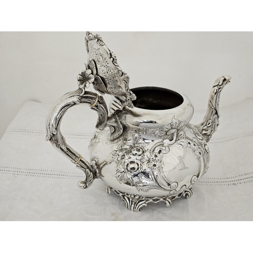 230 - Victorian Irish Silver Teapot, very decorative, with a floral finial and bird spout, chased floral d... 