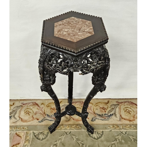 244 - Carved Hardwood Jardinere Stand, a red marble insert in the octagonal shaped top, on 3 legs, heavy f... 