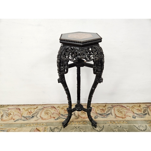 244 - Carved Hardwood Jardinere Stand, a red marble insert in the octagonal shaped top, on 3 legs, heavy f... 