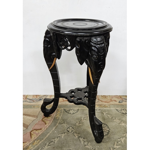 245 - Carved Plant Stand, in the form of 3 joined elephant heads and trunks, with wooden tusks and an unde... 