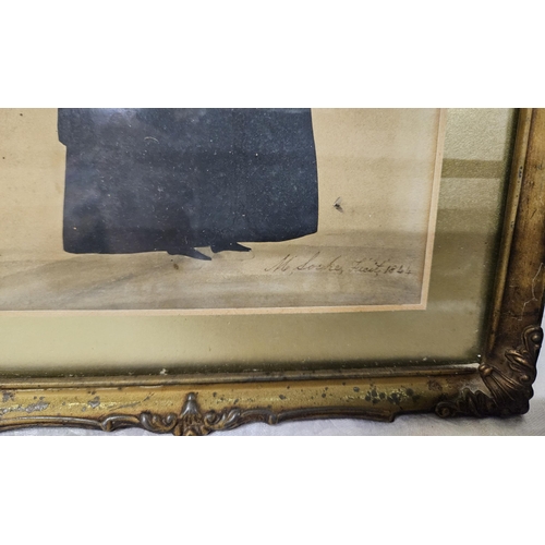 281 - Georgian Silhouette of a Lady carrying a rose, signed M Socke Fecit 1844, in a brass mounted frame, ... 