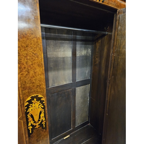 318 - Edwardian Mahogany Wardrobe, nicely inlaid panels around the central bevelled mirrored door, with a ... 