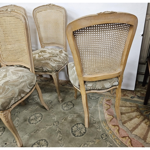 36 - Matching Set of 6 French Cane Back Bistro Chairs, painted cream, with padded seats, on sabre front l... 