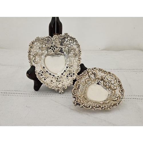 466 - Two similar Birmingham Silver Pin Dishes, each on 3 bun feet with ribbon detail and decorative pierc... 