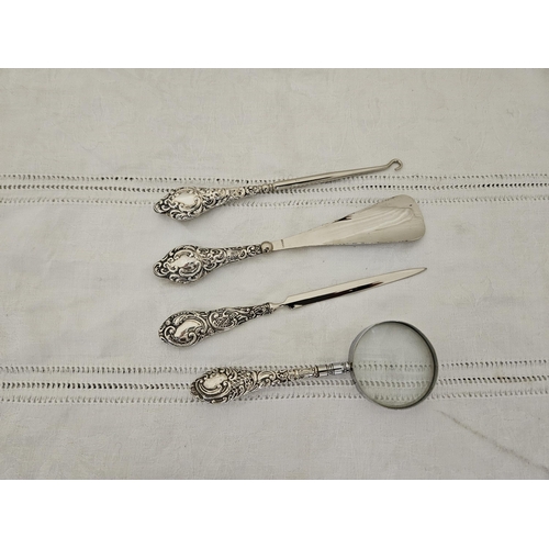 472 - 4-piece English decorative silver handled desk tools. incl a shoe horn, paper opener, button hook wi... 