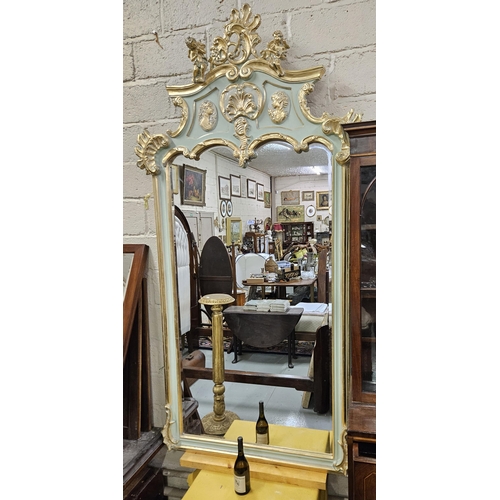 255 - Tall French Pier Mirror, in a carved wood frame, part painted green, with fino gold highlights, the ... 