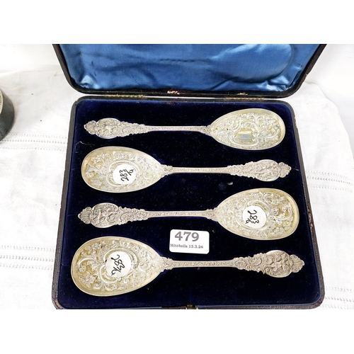 479 - Set of 4 London Silver large sized Berry Spoons, ornately chased, with cherub decorated handles, in ... 