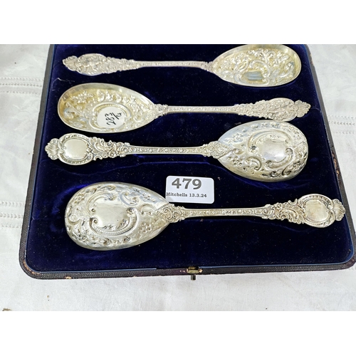 479 - Set of 4 London Silver large sized Berry Spoons, ornately chased, with cherub decorated handles, in ... 