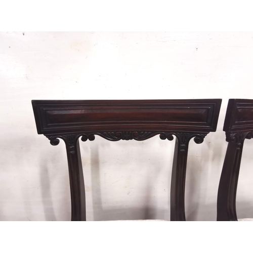 33 - Set of 4 Mahogany Dining Chairs, scroll designs to the curved upper rails, cream velour covered seat... 