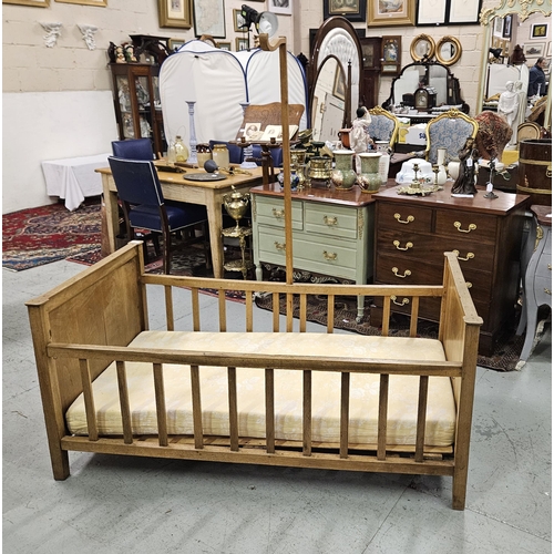 331 - Antique French beech Babys Cot, with railed sides and a removeable curtain pole (some woodworm hole... 