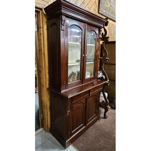 351 - Victorian Style Mahogany Bookcase with 2 glazed doors over 2 apron  drawers and a cabinet below (the... 