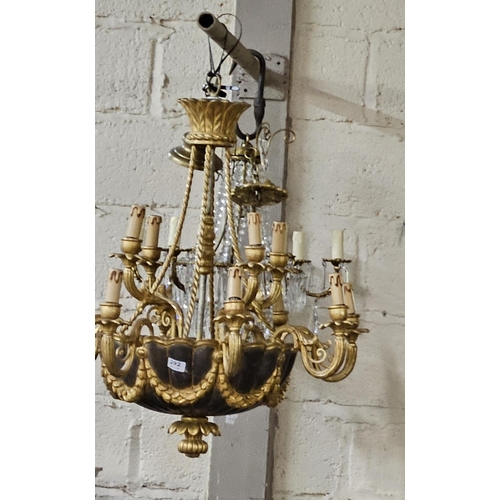 414 - A decorative gilded timber Empire period style Chandelier, with 4 upper branches, 8 branches below, ... 