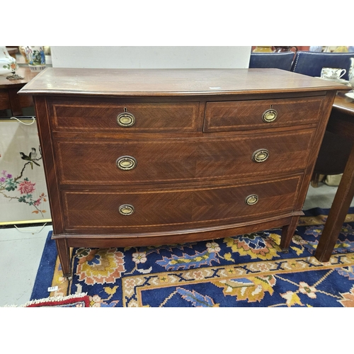 322 - Bow-front mahogany chest of drawers, satinwood inlaid, on tapered legs, castors, 84cmH x 115cmW x 54... 