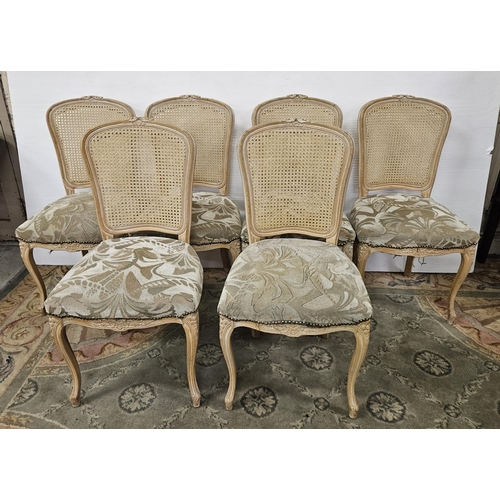 36 - Matching Set of 6 French Cane Back Bistro Chairs, painted cream, with padded seats, on sabre front l... 