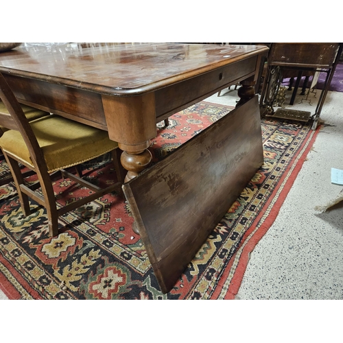 554 - Vic Mahogany Ext Dining Table on turned legs, cup castors, 1.2mW, 1.5m long (extends to 2m long when... 