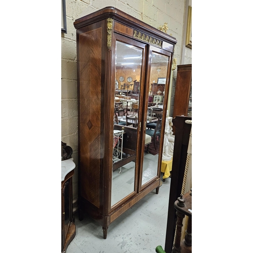 319 - Fine Tall 19thC French Armoire, the two doors opening to shelves and a hanging closet, intricately i... 