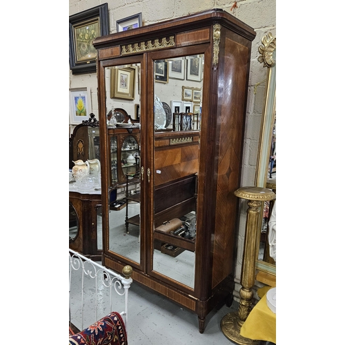 319 - Fine Tall 19thC French Armoire, the two doors opening to shelves and a hanging closet, intricately i... 