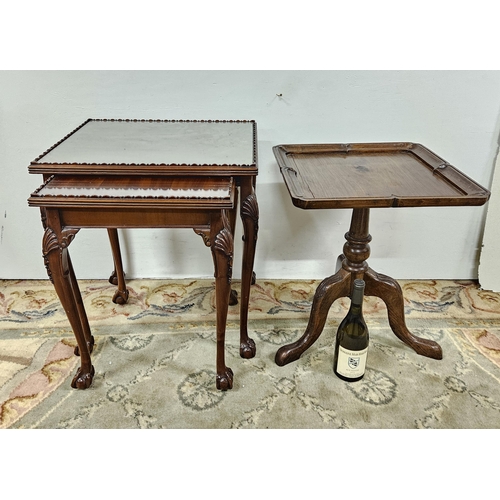 36 - Nest of 2 mahogany tables (glass preserves), ball, claw feet 52 x 60cm & a walnut low wine table on ... 