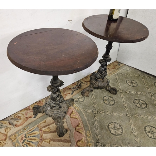 39 - Matching Pair of Bar Tables, with circular teak tops above decorative metal bases, on 3 scrolled fee... 