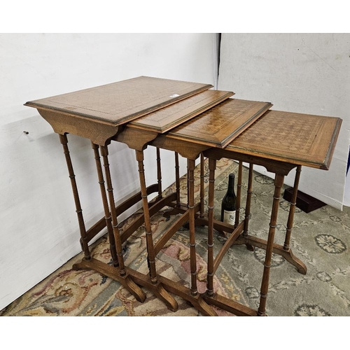 45 - Nest of 4 French parquetry design Tables, with brass rims and boxwood inlay to each top, all on spin... 