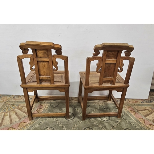 115 - Pair of Chinese Ceremonial Chairs, the decorative backs featuring carved fruit and figures with inst... 