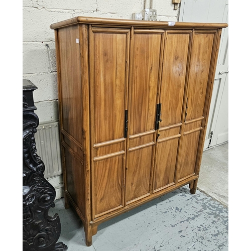 125 - Chinese Elm Cupboard, with 4 long panelled doors enclosing shelves, on raised feet, with metal door ... 