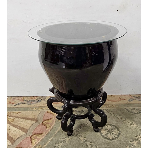 127 - Black Glazed Chinese Jardinière - bulbous shaped - scrolled hardware base, with a glass top, 64cmH