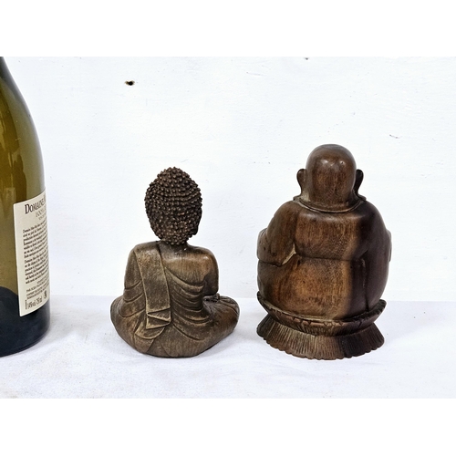 131 - 19thC small carved hardwood buddha, 14cmH & a carved diety, about 15cmh (2)