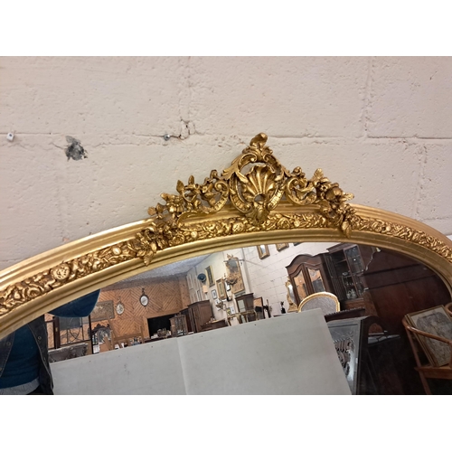 148 - Tall Carved Overmantle, Victorian style, painted gold with raised floral bands and a decorative shel... 