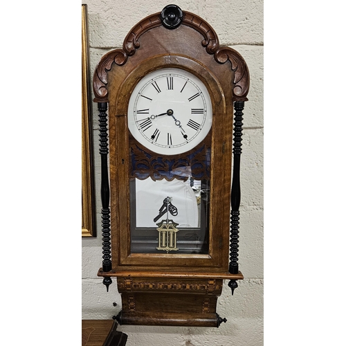 155 - Large American Wall Clock, in a decorative fretwork case, with a mirrored back, bobbin shaped column... 