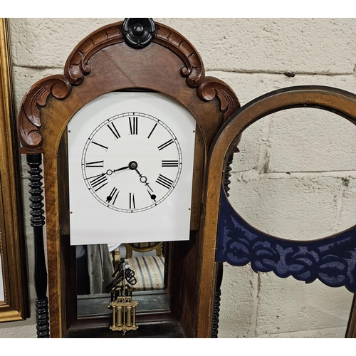 155 - Large American Wall Clock, in a decorative fretwork case, with a mirrored back, bobbin shaped column... 