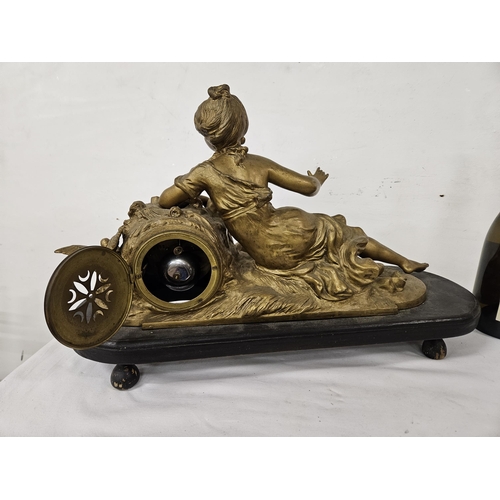 168 - Early 20thC Mantle Clock - a large reclining woman leaning to a small enamel faced clock, mtd on a 3... 