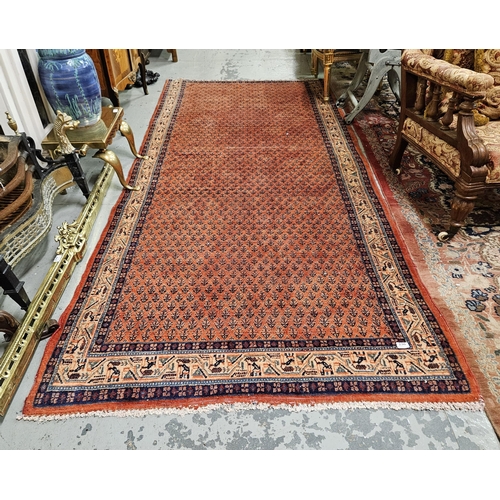 236 - Terracotta ground Vintage Persian Sourek regional Rug, all over design depicting an acorn, 3m x 1.35... 