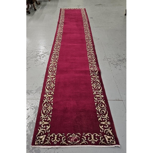 253 - Cerise ground handwoven large Persian Runner, 4.63m x 0.87m