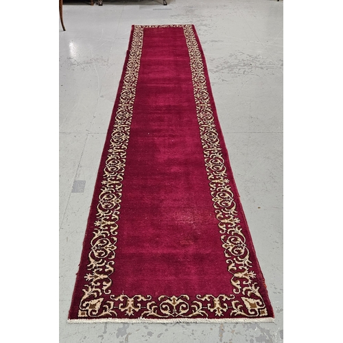 253 - Cerise ground handwoven large Persian Runner, 4.63m x 0.87m