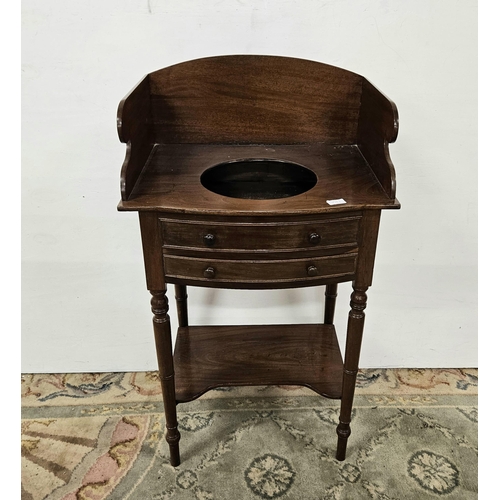 266 - Regency Mahogany Washstand, an oval shaped gallery over bowl well, above a single drawer, a faux dra... 